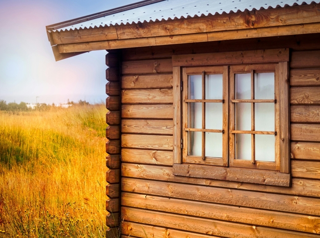 Какой брус лучше для строительства дома: клеёный или профилированный?